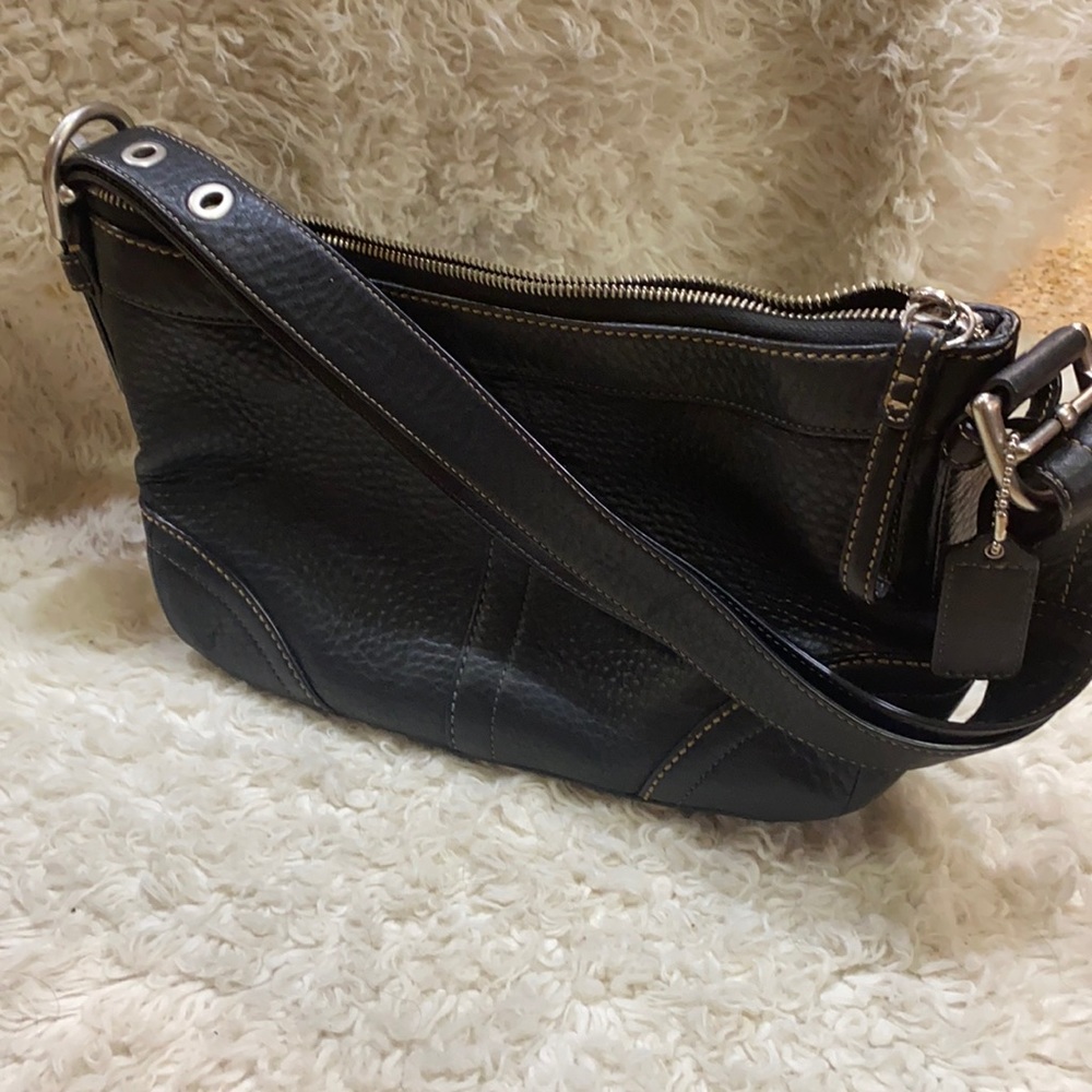 Coach black leather small purse.